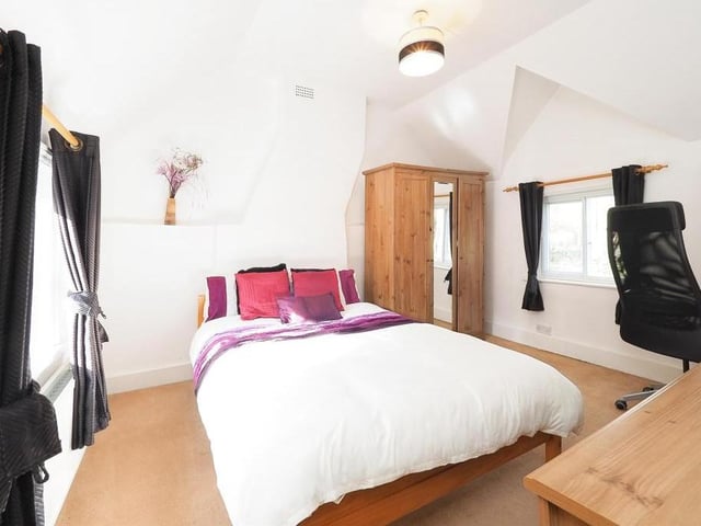 The third bedroom is full of brightness, thanks to windows to the front and back of the property. There is also space for a wardrobe and a desk.