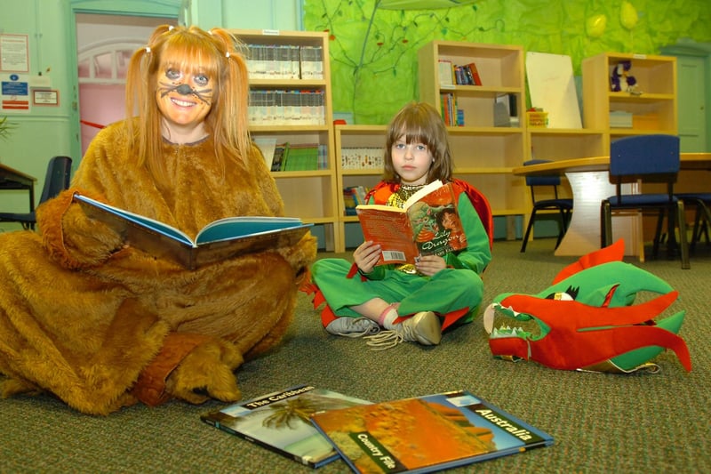 Staff member Christine Robson and pupil Carly Mawhinney at the opening of the school's new library in 2008.