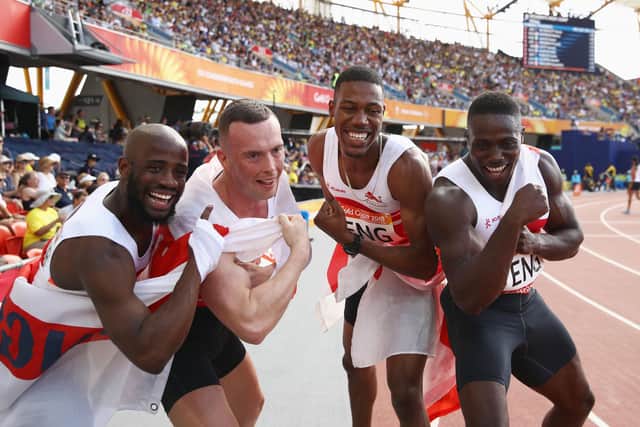 GOLD COAST, AUSTRALIA - APRIL 14:  Harry Aikines-Aryeetey, Reuben Arthur, Zharnel Hughes and Richard Kilty of England celebrate as they win gold in the Men's 4x100 metres relay final during athletics on day 10 of the Gold Coast 2018 Commonwealth Games at Carrara Stadium on April 14, 2018 on the Gold Coast, Australia.  (Photo by Cameron Spencer/Getty Images)