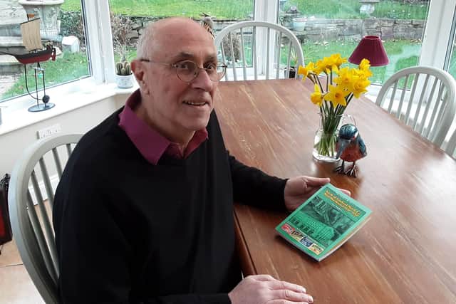 Author Alan Middleton with his updated version of his book on the Hartlepool match factory which has just been published.