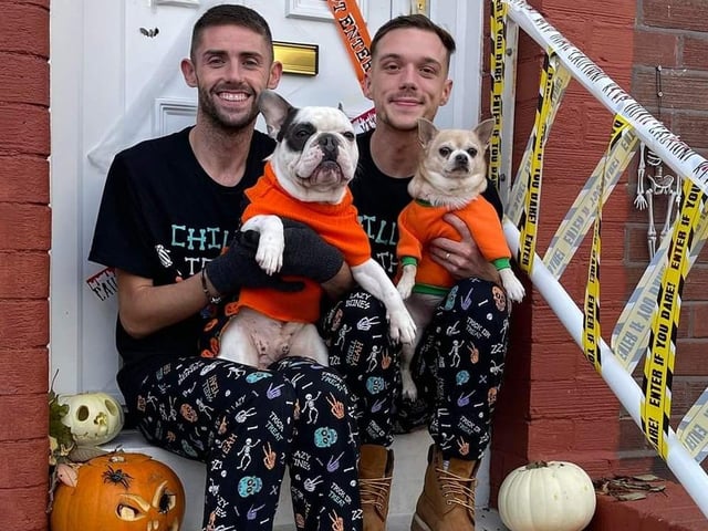The Halloween squad assembled for this cute and spooky photo! And those dogs are the cutest pumpkins we've ever seen ...