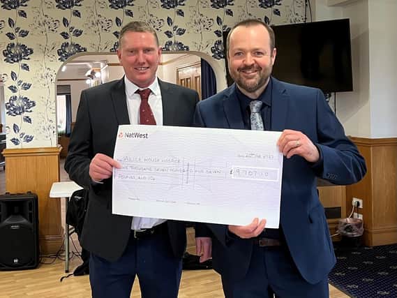 Left to right:  Heath Hardman of Hartlepool Golf Club and Greg Hildreth, Senior Communications Manager at Alice House Hospice, with the donation check.