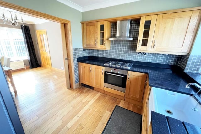 The kitchen is fitted with a range of appliances.