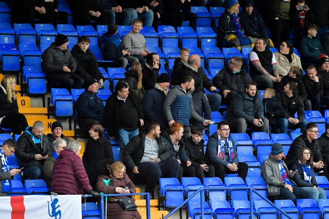 Pools supporters keep up to date with results elsewhere. (Photo: Scott Llewellyn | MI News)