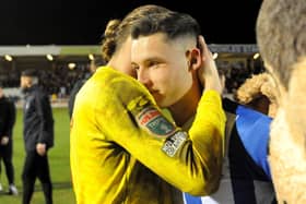 Ben Killip consoles Luke Molyneux after Hartlepool United's penalty shootout defeat to Rotherham United. Picture by FRANK REID