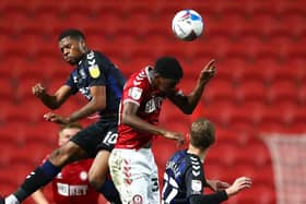 Middlesbrough striker Chuba Akpom challenges for a header against Bristol City.