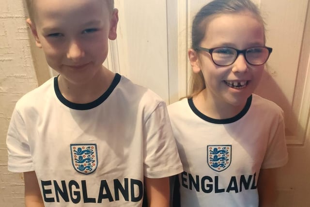 Emily and David, age 9, looking smart for England.