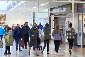 Shoppers in the Middleton Grange shopping centre. Picture by Frank Reid