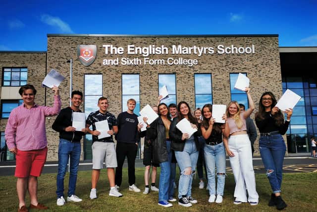 Smile all round as English Martyrs School and Sixth Form College get their A-level results.