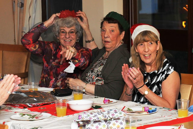 Residents and staff having a wonderful time at the Albany Court Christmas party 10 years ago.
