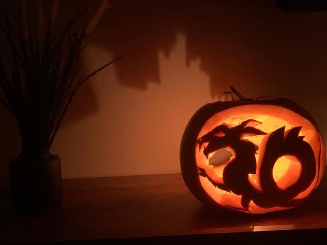 The Laidley Worm with Bamburgh Castle in the backgrond. Celebrating National Pumpkin Day and Halloween with SaFi Hagan.