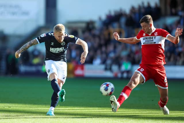 Millwall's Andreas Voglsammer takes a shot at goal during the Sky Bet Championship match at The Den, London.