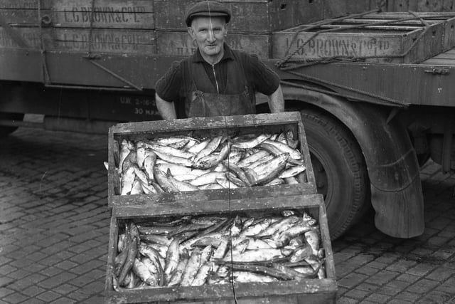 Boxes of herrings are moved at the Hartlepool Fish Quay in the 1950s.