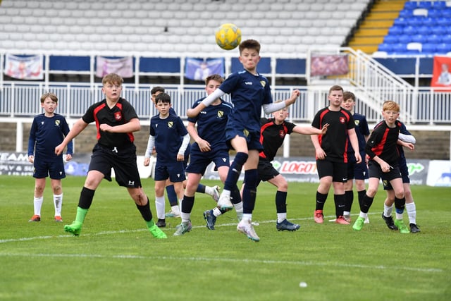 English Martyrs, red and black, versus High Tunstall in the year seven boys' cup final. Picture by FRANK REID