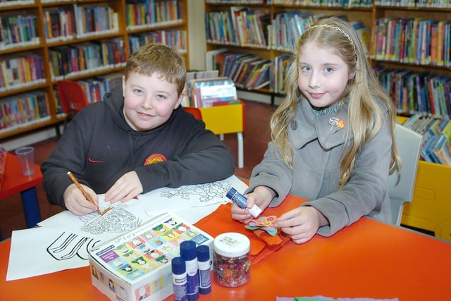 Lewis Barker and Eve Readman were making gifts for Mother's Day at Foggy Furze Library in 2010.