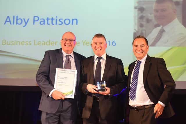Alby pictured collecting the Business Leader of the Year award from Kevin Byrne, MD of Seymour Civil Engineering (left) and Jeff Stelling, at the 2016 Hartlepool Business Awards.