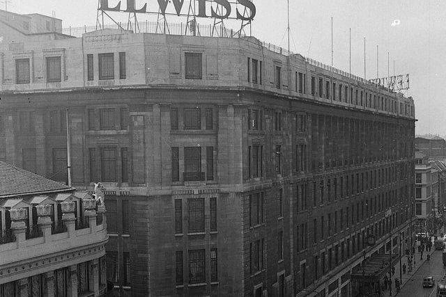 External view of Lewis Store, Argyle Street in Glasgow showing large sign on top of the building.