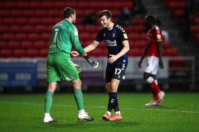 Marcus Bettinelli and Paddy McNair celebrate Middlesbrough's win over Bristol City.