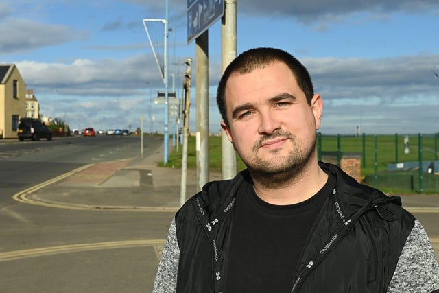 Dean Bennett takes a break from his walk through Seaton Carew to pose for the camera.  Picture by FRANK REID.