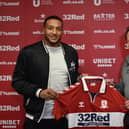 New Middlesbrough signing Nathaniel Mendez-Laing and manager Neil Warnock.