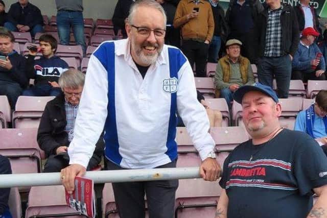 Author Stephen Poxon, left, at a Hartlepool United match with fellow fan Andy Fear.
