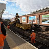 Workmen demolishing the disused platform 3 at Hartlepool Railway Station.