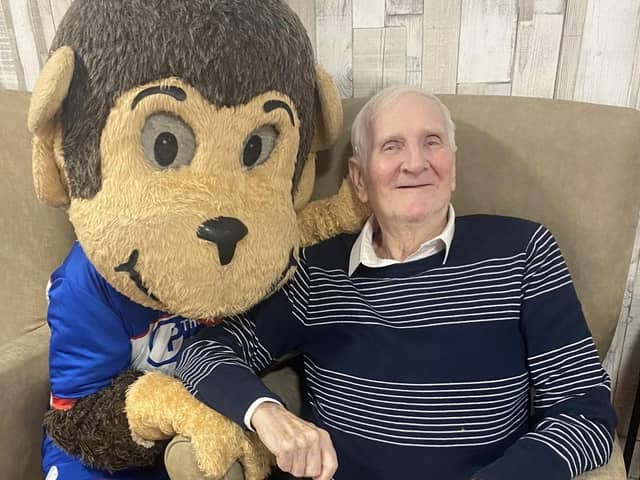 Hartlepool United mascot H'Angus with Queens Meadow Care Home resident Bernie Bell.