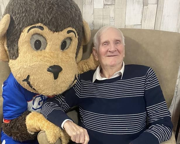 Hartlepool United mascot H'Angus with Queens Meadow Care Home resident Bernie Bell.