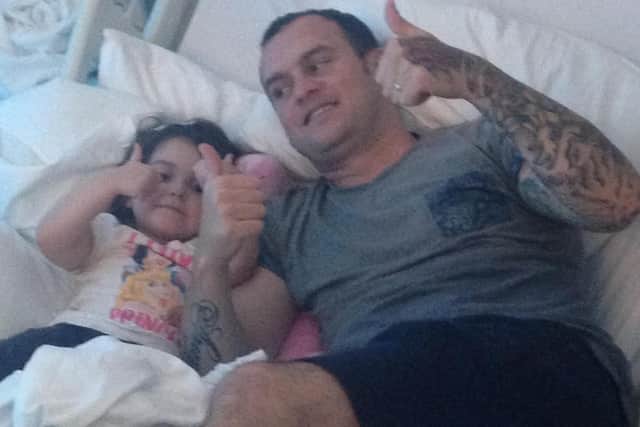 Thumbs-up from Lyla and dad Paul during a hospital stay in 2016.