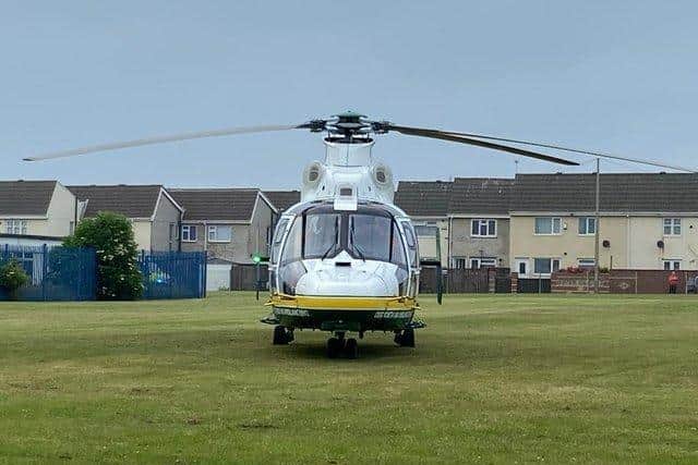 The Great North Air Ambulance's helicopter landed on the field of St Helen's Primary School after it was called in by the North East Ambulance Service.