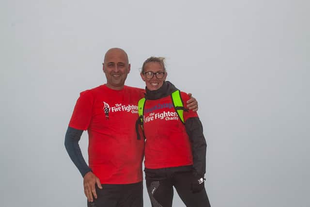 Stu's sister, Sam Crebbin (right) with Spence Jones (left) at the top of Pen y Fan.