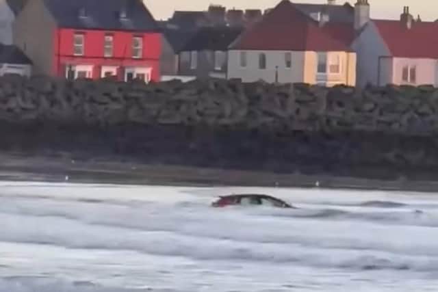 A photo taken from a video of the car in water in between the Headland and Hartlepool Marina. Picture and video courtesy of Hartlepool News & Alerts.