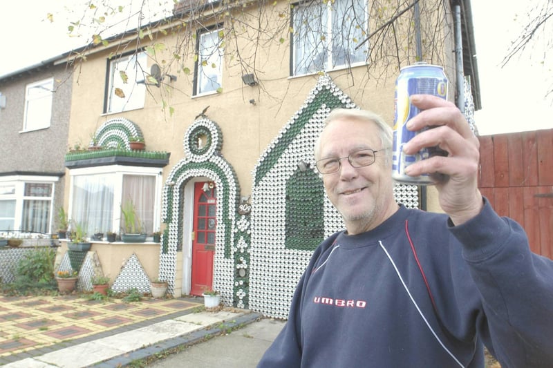 Pictured here in 2010, the late Phil Muspratt decorated his Raby Road home with up to 75,000 beer cans.