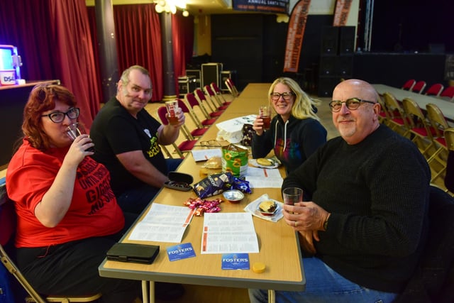 Left to right: Jemma Lewis, Gareth Wood of Bedlington, Sarah and Richard McDonald of Hartlepool check out the list of drinks available while ticking into some snacks.