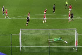 Rotherham striker Matt Crooks shoots to score the opening goal against Middlesbrough.