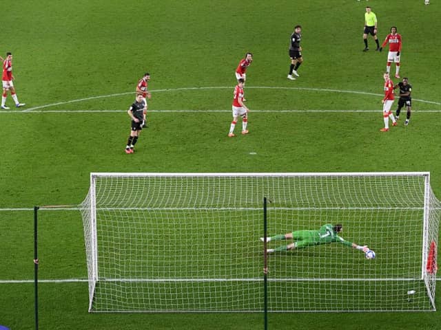 Rotherham striker Matt Crooks shoots to score the opening goal against Middlesbrough.