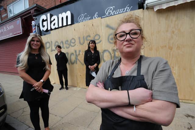 Glam Hair Salon owner Lisa Turner, with staff Brogan Milson, Catherine Bullock, and Maria Arnell outside the boarded up business in Seaside Lane, Easington Colliery.