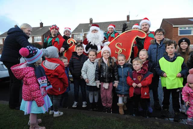 Youngsters greet Santa and his sleigh at Seaton Carew's Hornby Park, for last year's Santa Tour.
