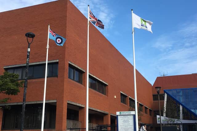 The Royal Air Force Association Ensign (left) flying outside Hartlepool Civic Centre.