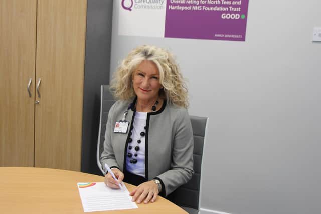 North Tees and Hartlepool NHS Foundation Trust chief executive Julie Gillon signing letter to the community.