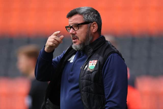 Head coach Dean Brennan was left frustrated with his side despite their 3-2 success over Hartlepool United. (Photo by Marc Atkins/Getty Images)