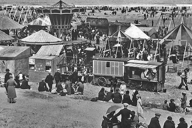 What a busy day at Seaton Carew and plenty of people seemed to be loving the fairground. Photo: Hartlepool Library Service.