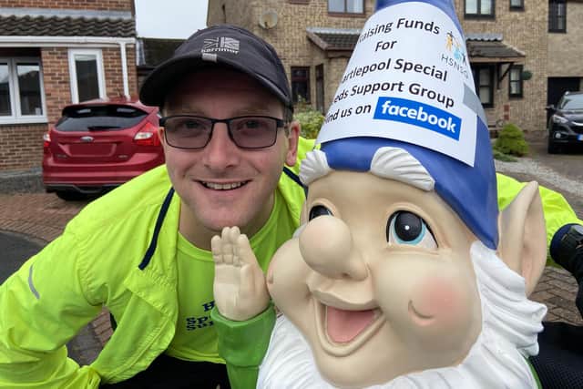 Jamie Allison with his garden gnome Nigel before the start of his half marathon run in aid of the Hartlepool Special Needs Support Group. Picture by FRANK REID