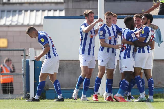 Hartlepool United's Tyler Burey celebrates with his team mates after scoring their first goal during the Sky Bet League 2 match between Hartlepool United and Carlisle United at Victoria Park, Hartlepool on Saturday 28th August 2021. (Credit: Mark Fletcher | MI News)