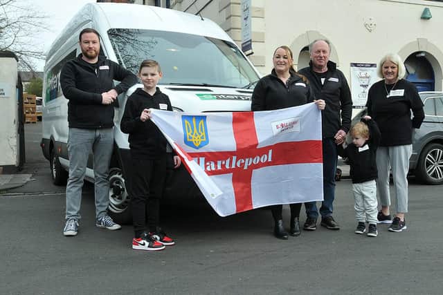 Kevin (left) and Graham Hogg are wished a safe trip and waved off by family members (left to right) Joel, Lyndsey, Helen, and Charlie Hogg before they set off to the Ukraine.   Picture by FRANK REID.