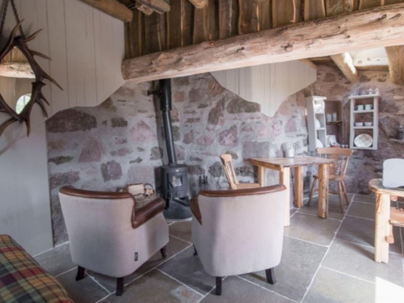 The handcrafted interiors have been created from wood and stone.