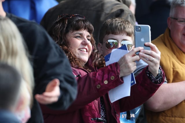 Selfie time at the Suit Direct Stadium as Hartlepool United supporters capture memories. (Credit: Mark Fletcher | MI News)