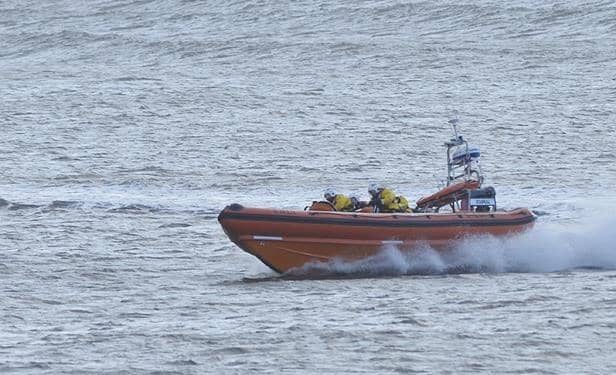 A Hartlepool RNLI lifeboat was launched to rescue a windsurfer who got into difficulty in strong winds.