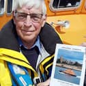 Hartlepool RNLI chairman, Malcolm Cook, pictured with a copy of his new book.