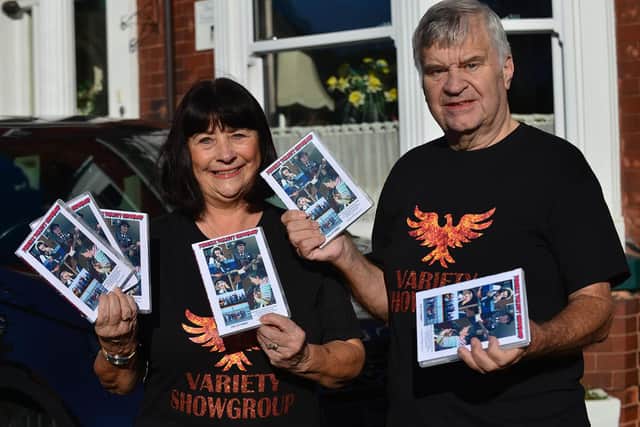 Phoenix Variety Showgroup members Derrick and Shirley Rowbotham with a selection of the new DVDs. Picture by FRANK REID
